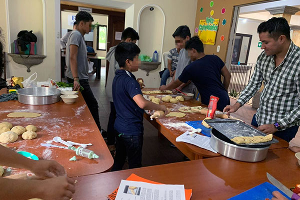 From the Shadows | Covenant House Guatemala feeding boys who have been through trauma