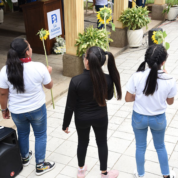 Young girls at opening of new house in Guatemala