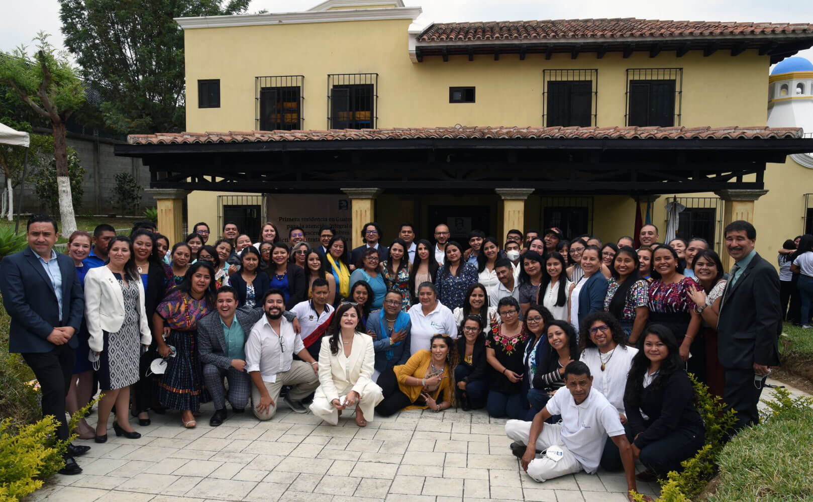 Group in front of new residence in Guatemala